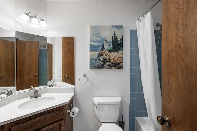 bathroom with shower / tub combo, vanity, and toilet