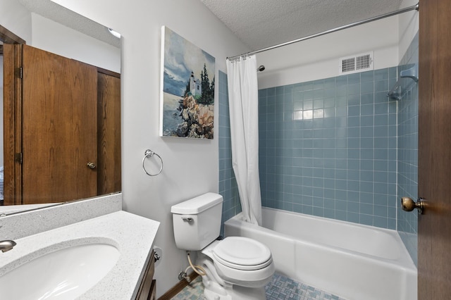full bathroom featuring vanity, toilet, visible vents, a textured ceiling, and shower / tub combo with curtain