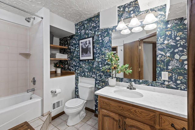 full bath with vanity, tile patterned floors, toilet, visible vents, and wallpapered walls