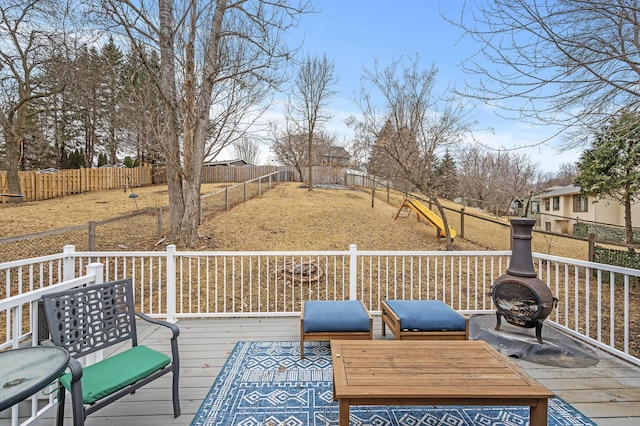 deck with a fenced backyard