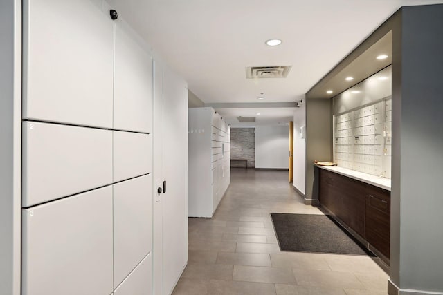 401 2nd St Unit 202, Minneapolis, MN 55401 - hall featuring mail area, visible vents, recessed lighting, and baseboards