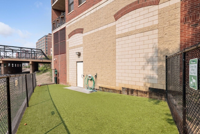 401 2nd St Unit 202, Minneapolis, MN 55401 - view of home's exterior featuring brick siding and fence