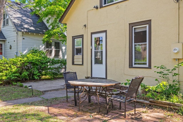 view of patio with outdoor dining area