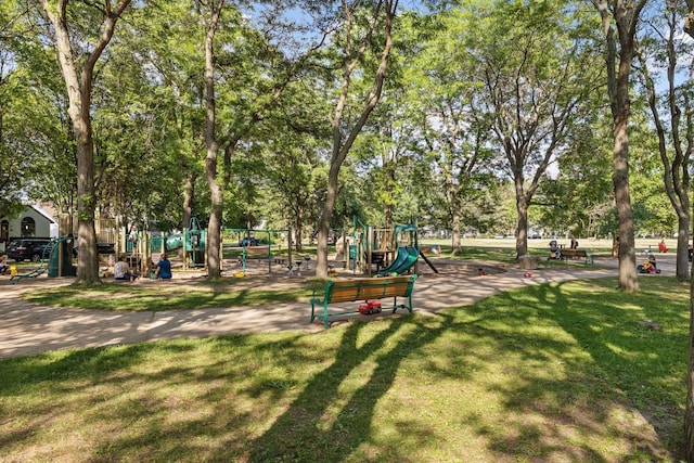 view of community featuring a yard and playground community