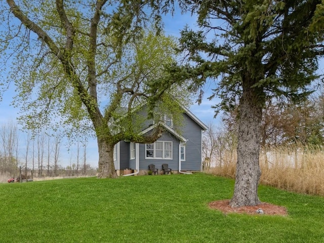17492 460th Ln, Waterville, MN 56096 - rear view of property featuring a yard