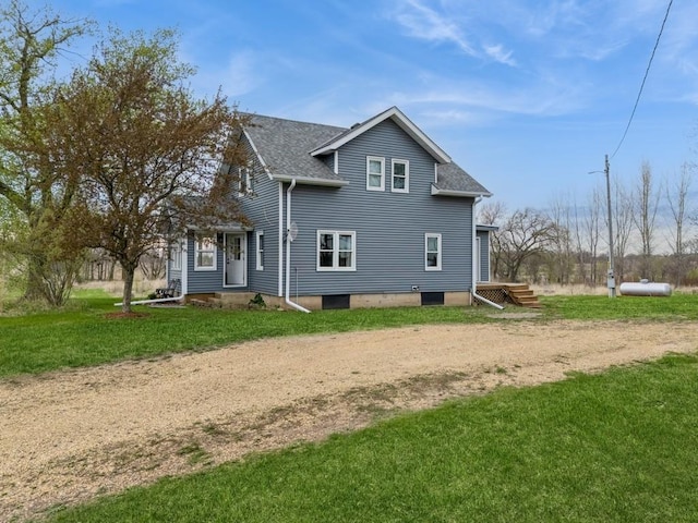 17492 460th Ln, Waterville, MN 56096 - back of property with a yard, roof with shingles, and dirt driveway