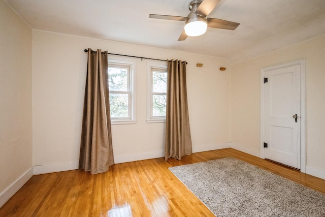 17492 460th Ln, Waterville, MN 56096 - spare room featuring baseboards, light wood finished floors, and ceiling fan