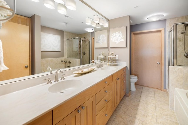 full bath with a stall shower, a garden tub, double vanity, tile patterned flooring, and toilet