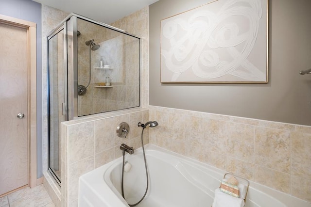 full bath with a shower stall and a bath