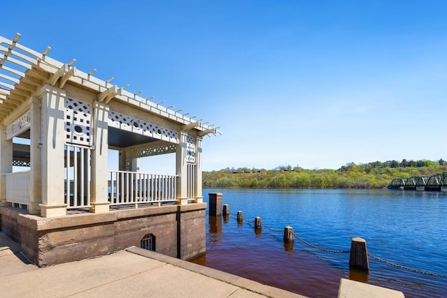 dock area featuring a water view