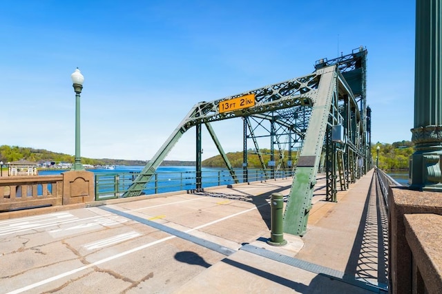surrounding community with a water view