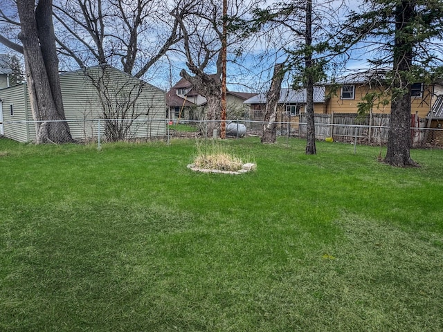view of yard featuring fence