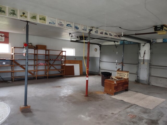 122 10th St, Madison, MN 56256 - garage with a garage door opener