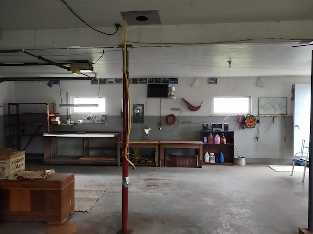 122 10th St, Madison, MN 56256 - garage with a workshop area and electric panel