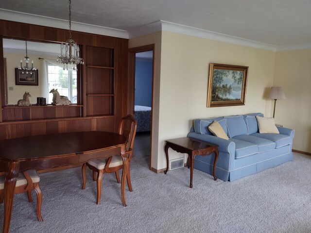 122 10th St, Madison, MN 56256 - dining space with crown molding, a chandelier, carpet floors, and baseboards