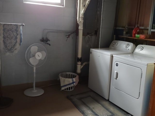 122 10th St, Madison, MN 56256 - laundry room featuring washer and dryer