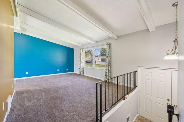 8040 Xenia Ave N, Brooklyn Park, MN 55443 - carpeted empty room with baseboards and a textured ceiling
