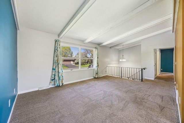 8040 Xenia Ave N, Brooklyn Park, MN 55443 - carpeted spare room featuring beam ceiling and baseboards