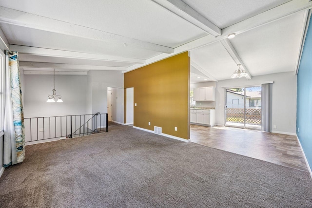 8040 Xenia Ave N, Brooklyn Park, MN 55443 - spare room with a chandelier, carpet floors, and baseboards