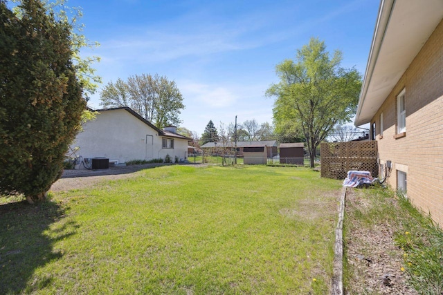 8040 Xenia Ave N, Brooklyn Park, MN 55443 - view of yard with central air condition unit