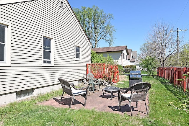view of yard with a fire pit and a patio area
