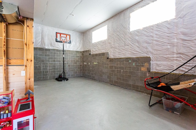 basement featuring concrete block wall