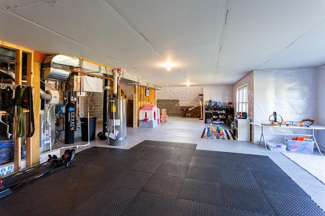 below grade area featuring water heater