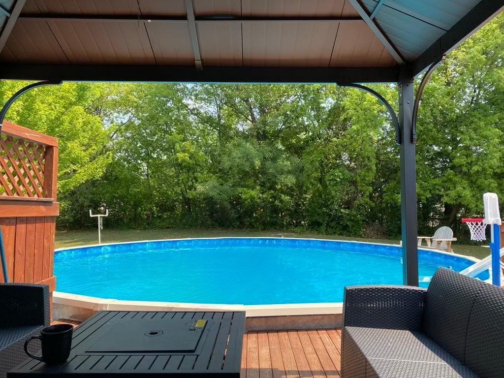 1312 Widgeon Way, Buffalo, MN 55313 - outdoor pool featuring a deck