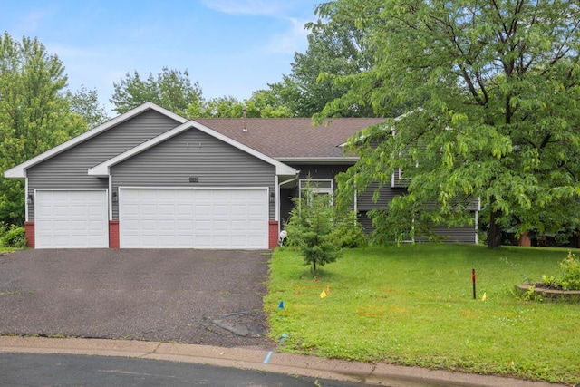 1312 Widgeon Way, Buffalo, MN 55313 - view of front of property with asphalt driveway, an attached garage, a front lawn, and brick siding
