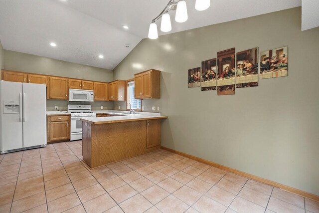 1312 Widgeon Way, Buffalo, MN 55313 - kitchen with white appliances, light countertops, light tile patterned floors, vaulted ceiling, and recessed lighting