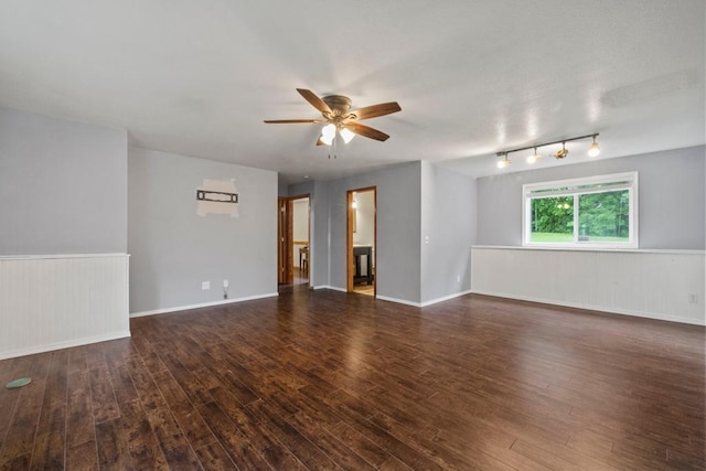 1312 Widgeon Way, Buffalo, MN 55313 - unfurnished living room with ceiling fan, wood finished floors, and wainscoting