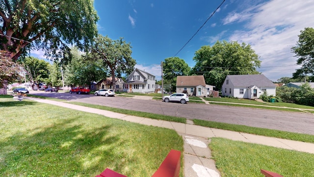 view of yard featuring a residential view