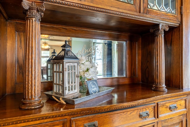 detailed view of decorative columns and wood walls