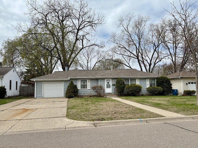 single story home featuring a garage, fence, a front lawn, and driveway