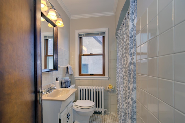full bathroom with radiator, tile walls, toilet, vanity, and tile patterned floors