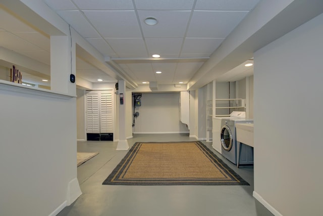 washroom with recessed lighting and baseboards
