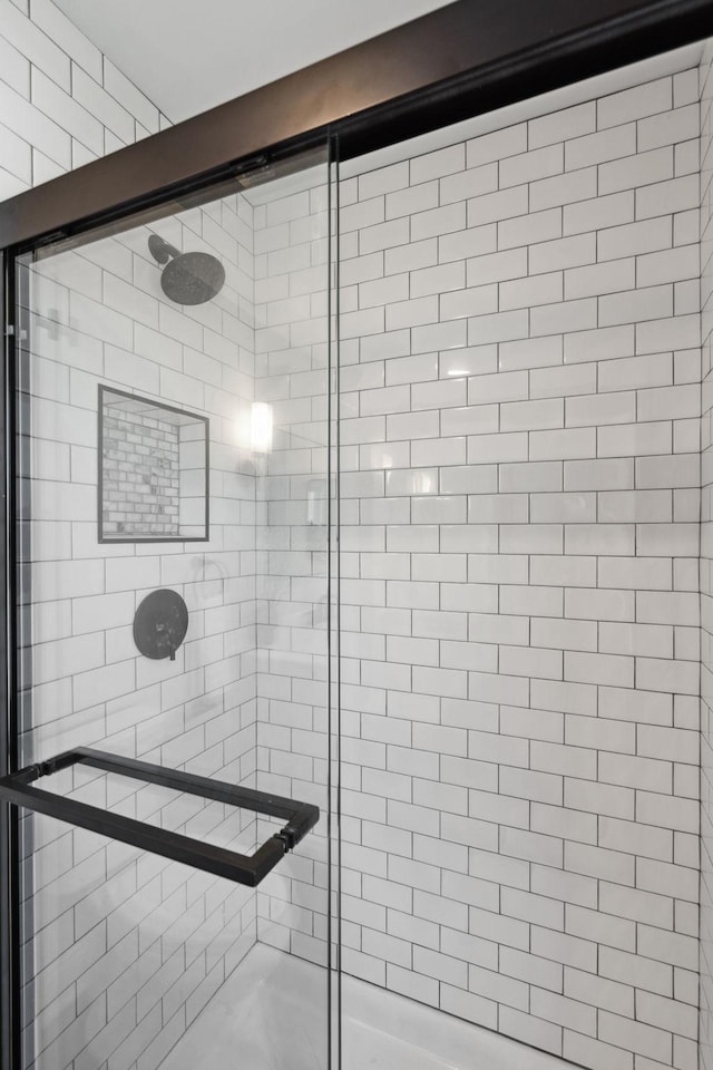 bathroom featuring a stall shower