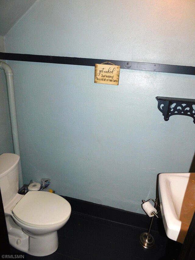 bathroom featuring toilet