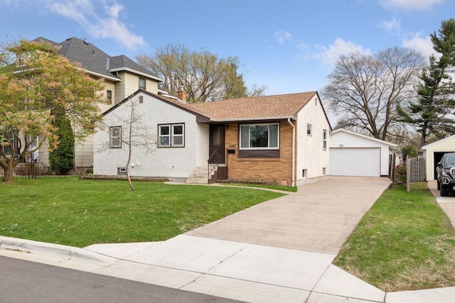 view of front of property with an outbuilding, brick siding, a garage, a front yard, and roof with shingles