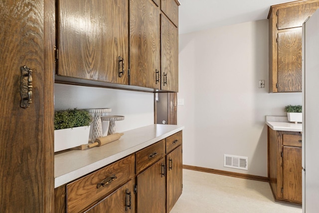 bar with visible vents and baseboards