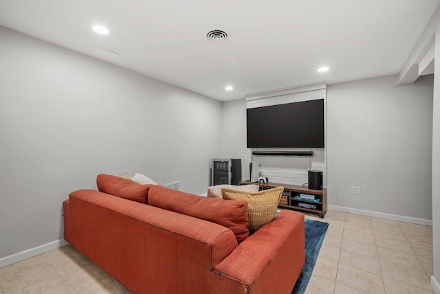 living room featuring recessed lighting, baseboards, visible vents, and tile patterned flooring