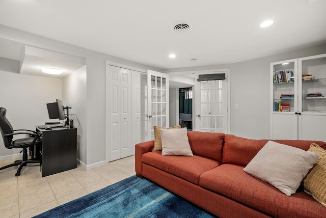 living room with visible vents, baseboards, recessed lighting, french doors, and light tile patterned floors