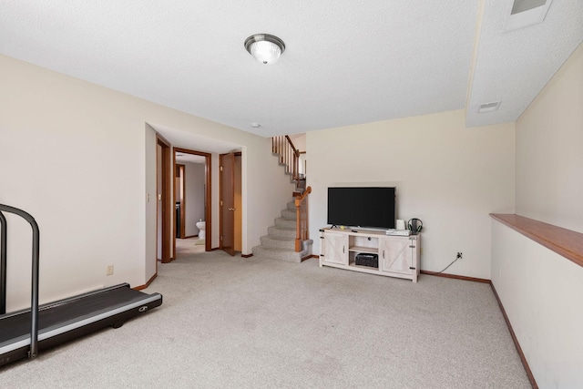 612 19th St N, Sartell, MN 56377 - exercise area with baseboards, visible vents, and carpet
