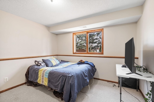 612 19th St N, Sartell, MN 56377 - bedroom with baseboards, visible vents, a textured ceiling, and carpet flooring