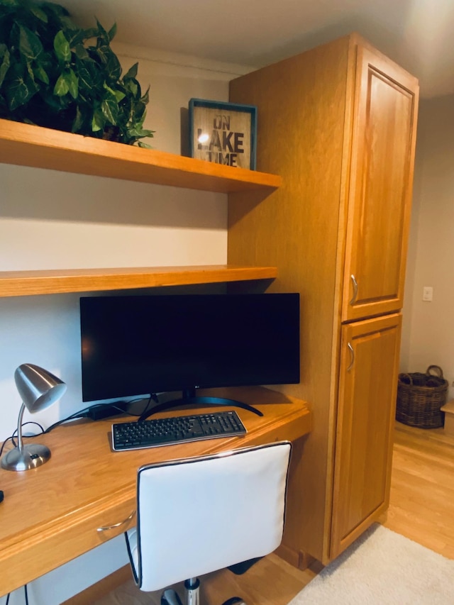 office area with light wood-style flooring