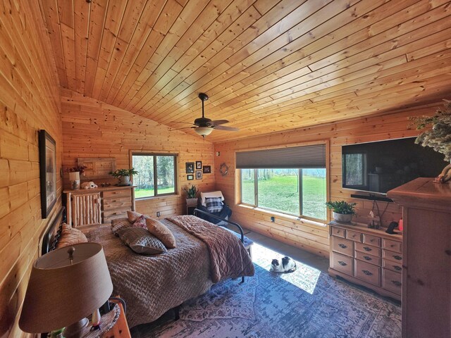49818 Long Lake Trl, Bigfork, MN 56628 - carpeted bedroom with lofted ceiling, wooden walls, multiple windows, wooden ceiling, and ceiling fan