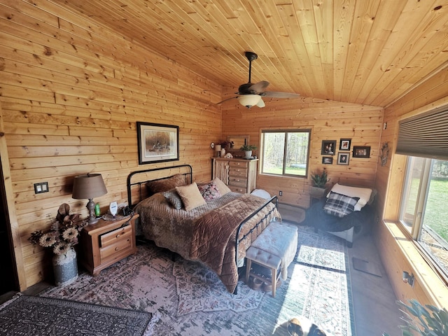 49818 Long Lake Trl, Bigfork, MN 56628 - bedroom featuring vaulted ceiling, wood walls, and wooden ceiling