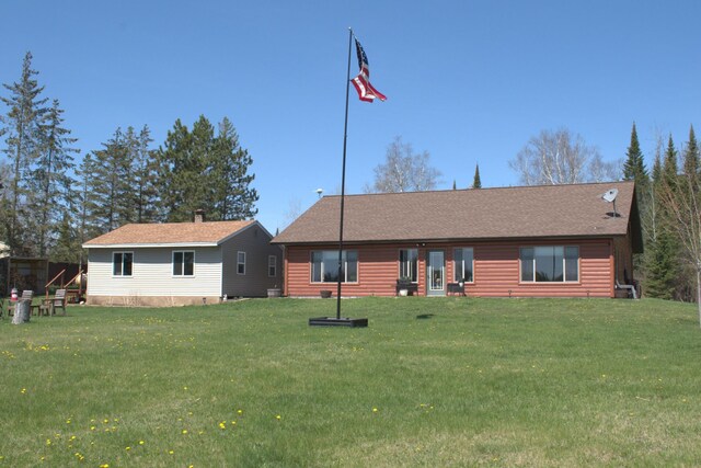 49818 Long Lake Trl, Bigfork, MN 56628 - back of property with a yard and a shingled roof