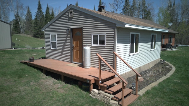 49818 Long Lake Trl, Bigfork, MN 56628 - rear view of house featuring a yard and a deck