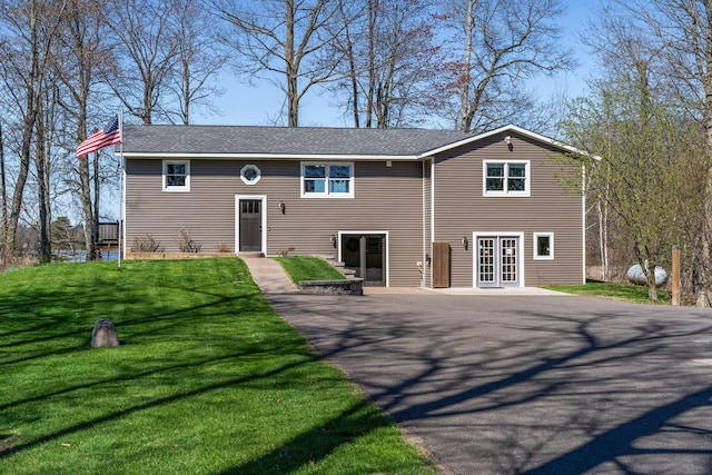 695 Pine Lake Ln, Bone Lake Twp, WI 54837 - view of front of home with a front lawn and french doors